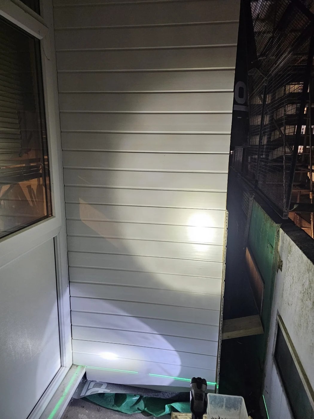 Project 1 cladding beside window